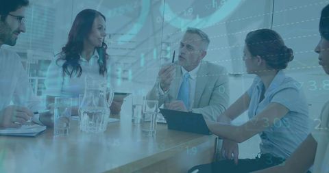 Diverse Business Team in Strategy Meeting with Financial Overlay