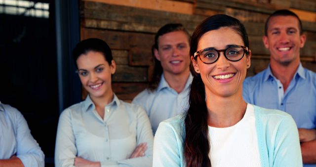 Confident Businesswoman Leading Team Smiling at Camera - Download Free Stock Images Pikwizard.com