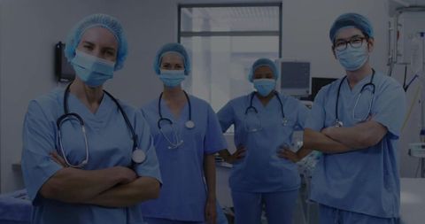 Surgical Team Posing Confidently in Operating Room