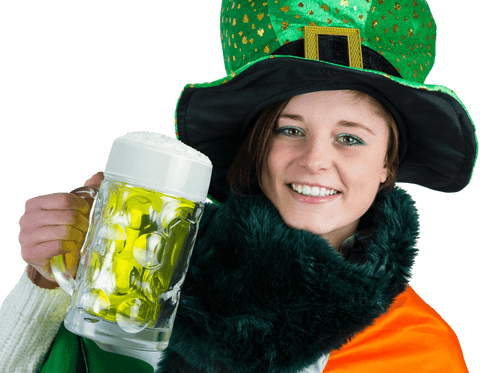 Cheerful woman in green attire with beer celebrating saint patrick's day