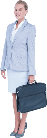 Confident businesswoman in suit holding transparent briefcase