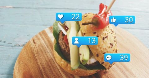 Social media notifications highlighting gourmet avocado slider with sesame bun and chili