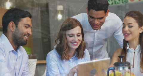 Diverse Business Team Collaborating with Digital Tablet Technology