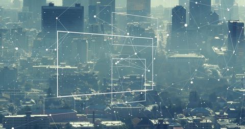 Futuristic Cityscape with Digital Network Overlays