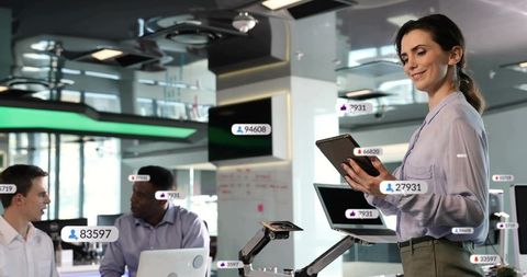 Businesswoman presenting data on tablet with analytics overlays in modern open office workflow