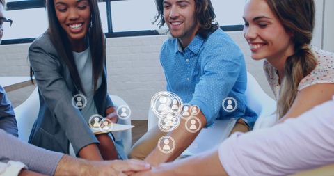 Diverse team collaborating with digital connection icons