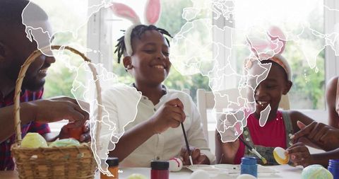 Family Painting Easter Eggs Together at Home Joyful Siblings Wearing Bunny Ears with Parent