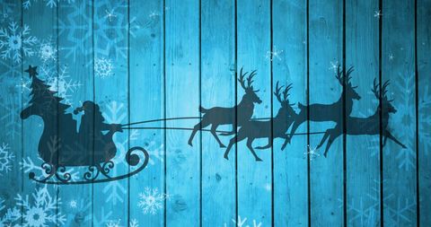 Santa Sleigh Silhouette Christmas Design on Blue Wood