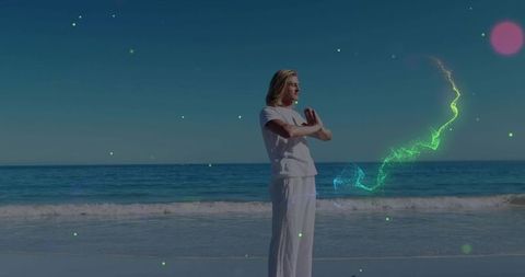 Barefoot man meditating on beach with neon energy trail and pink orb