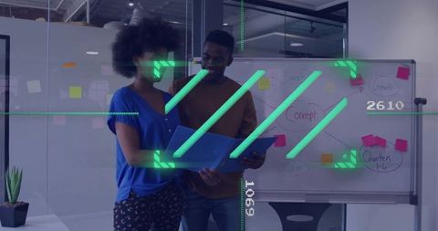 Team reviewing plans with augmented reality overlay in modern office collaboration