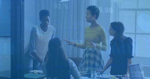 Diverse Business Team Discussing Financial Data Strategically