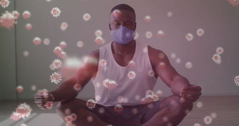 Man meditating amid covid-19 cells and practicing safety