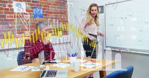 Creative Business Leaders Analyzing Financial Data with Technology Integration