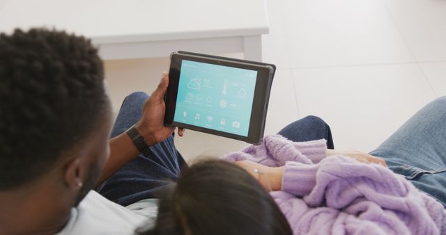 Couple Checking Smart Home Controls on Tablet Together - Download Free Stock Images Pikwizard.com