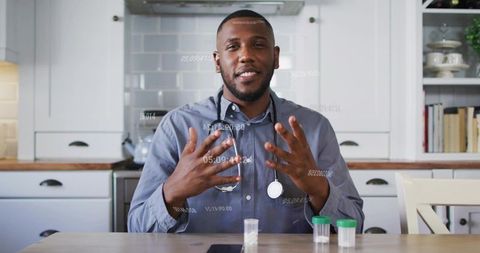 Doctor explaining medical concepts with samples at home