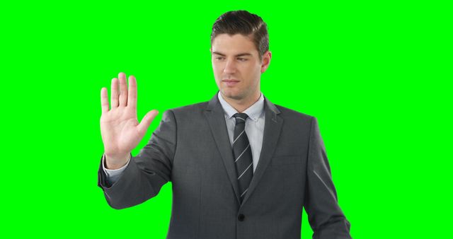 Businessman Making Gesture Against Green Screen - Download Free Stock Images Pikwizard.com