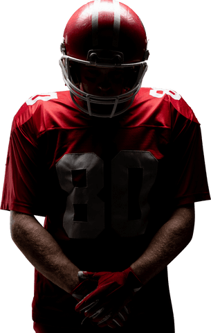 Young athlete in football gear on transparent background