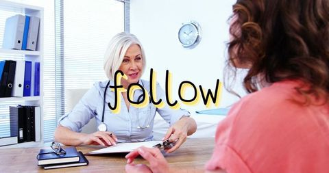 Doctor consulting patient in clinical office