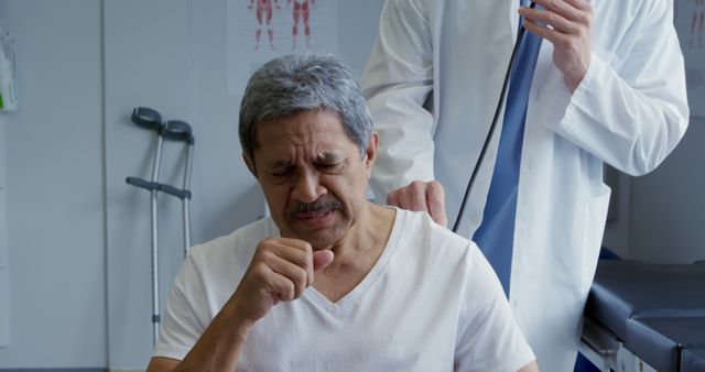 Doctor Examining Coughing Elderly Man in Medical Clinic - Download Free Stock Images Pikwizard.com