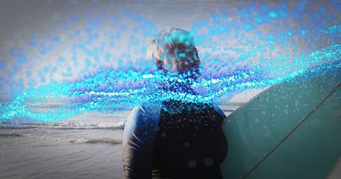 Senior Surfer with Digital Wave Effect at Beach