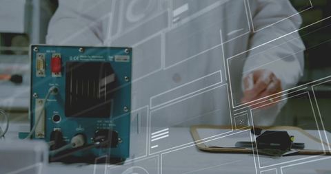 Lab technician working with scientific instruments in laboratory