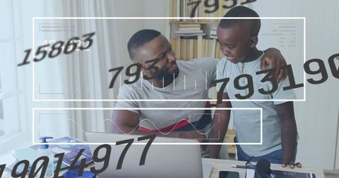 Father and Son Bonding Over Technology in Digital Workspace