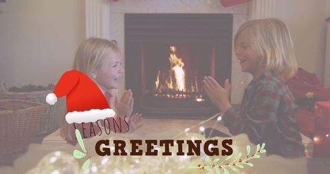 Kids Enjoying Clapping Game by Fireplace During Festive Season