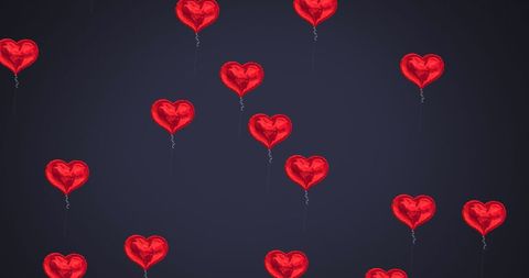 Floating Heart Balloons on Dark Background