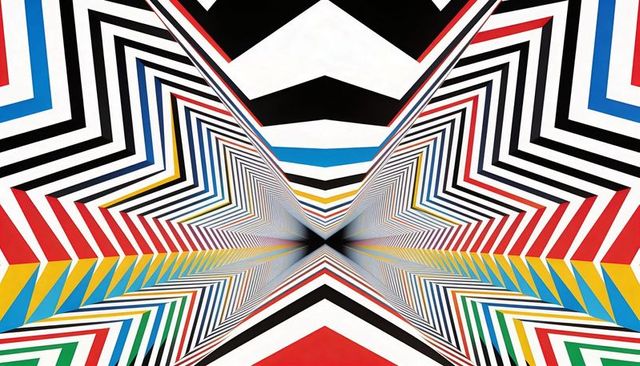 Colorful chevron tunnel mural creating optical illusion with geometric stripes