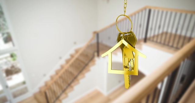 Close-up View of Golden Key with House-shaped Keychain in Modern Home Interior - Download Free Stock Images Pikwizard.com