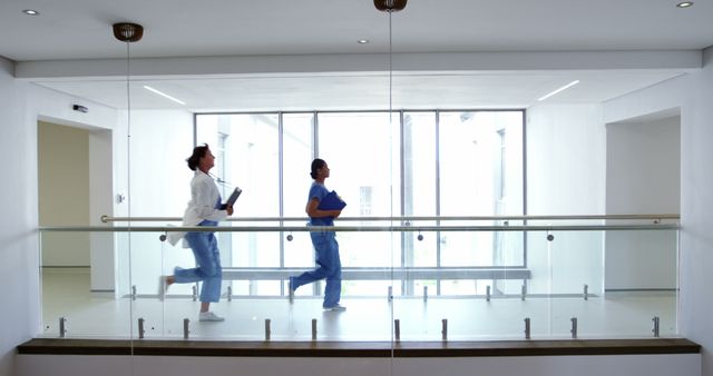 Medical Professionals Rushing in Hospital Corridor - Download Free Stock Images Pikwizard.com