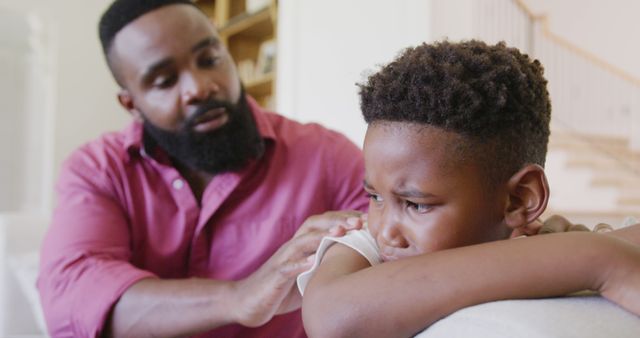 Father Comforting Upset Son at Home - Download Free Stock Images Pikwizard.com