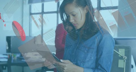 Businesswoman Interacting with Infographic Interface in Modern Office