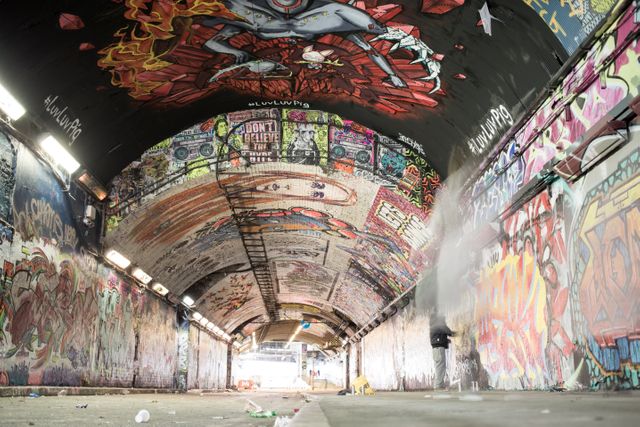 Urban Graffiti Art Tunnel with Diverse Street Art Murals - Download Free Stock Photos Pikwizard.com