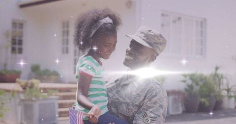 African American Soldier Hugging Daughter in Warm Embrace