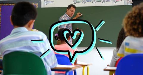 Male teacher writing on chalkboard teaching elementary class with heart graphic overlay