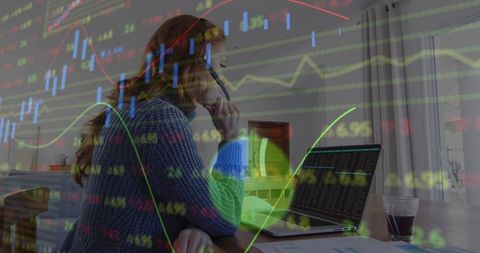 Analyzing market charts from home office using laptop headset for remote trading