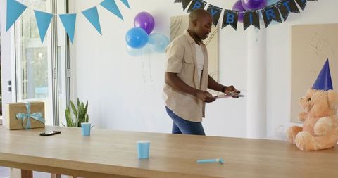 Preparing Decorations for Family Birthday Celebration