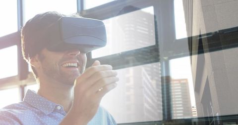 Businessman Embracing Virtual Reality With Cityscape Overlay - Download Free Stock Images Pikwizard.com