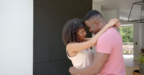 Romantic Couple Embracing in Modern Home Environment