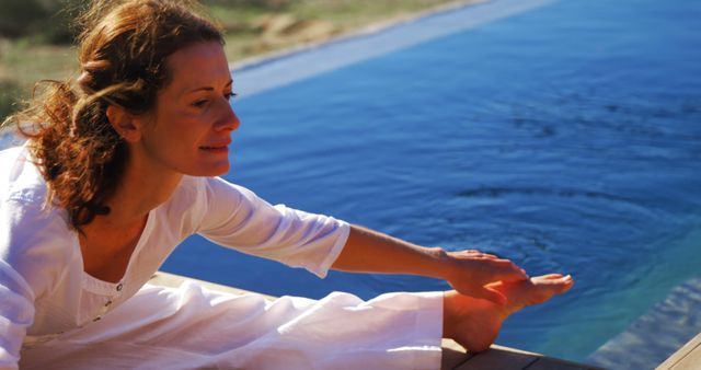 Woman Doing Yoga Pose by Outdoor Pool in Relaxing Morning - Download Free Stock Images Pikwizard.com