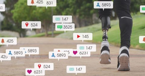an african american man with a prosthetic leg is jogging along a scenic park path, surrounded by digital pop-up notifications symbolizing social media activity. this juxtaposition reflects the interaction between physical fitness, technology, and community engagement. useful for illustrating topics about disability awareness, overcoming challenges, technology's impact on daily life, and social interaction in the digital age.