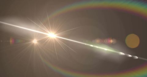 Vibrant Lens Flare and Light Burst on Grey Background - Download Free Stock Images Pikwizard.com