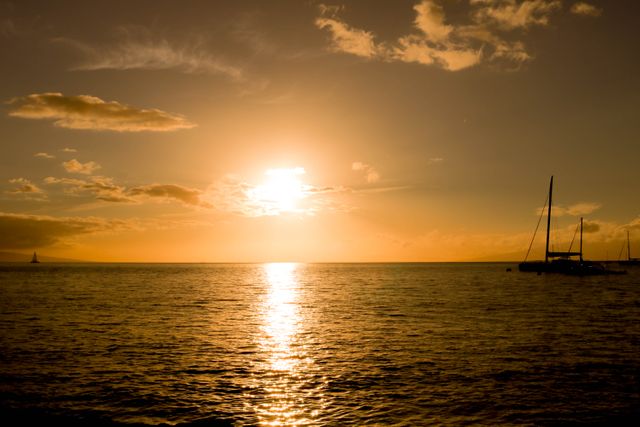 Golden Sunset Over Calm Ocean With Sailing Boats - Download Free Stock Photos Pikwizard.com