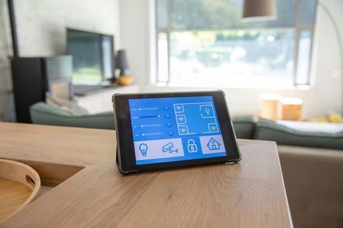 Smart Home Tablet Interface in Modern Living Room