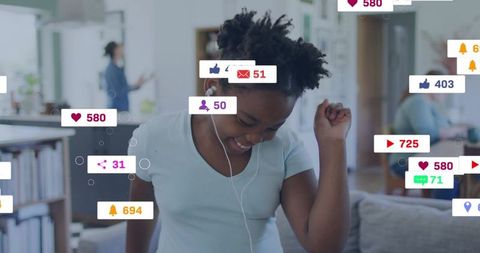Joyful child dancing with earbuds at home surrounded by social media notifications and icons