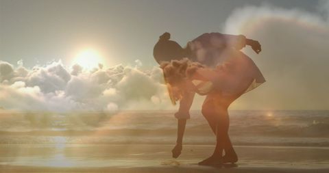Serene Beach Scene with Sunlit Clouds and Woman - Download Free Stock Images Pikwizard.com