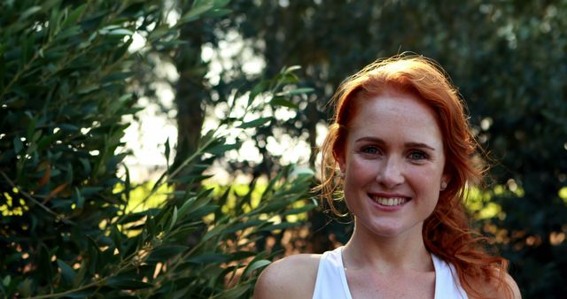 Smiling Woman with Red Hair Enjoying Nature Outdoors - Download Free Stock Images Pikwizard.com