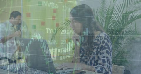 Financial Analysis Specialist Using Laptop in Modern Office