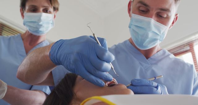 Dentists Performing Dental Check-up on Patient - Download Free Stock Images Pikwizard.com